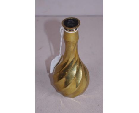 19th century fluted gilt metal desk seal with intaglio figure's head matrix, height 11cm approx.