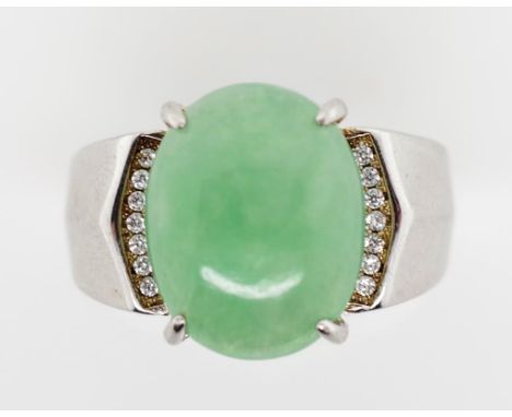 Natural jade and silver ring. Marked 925 silver ring Approx jade cabochon 15mm x 12mm size, ring size S.