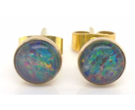 Opal and 9ct studs. Triplet cabochon opals and marked 9ct gold setting.