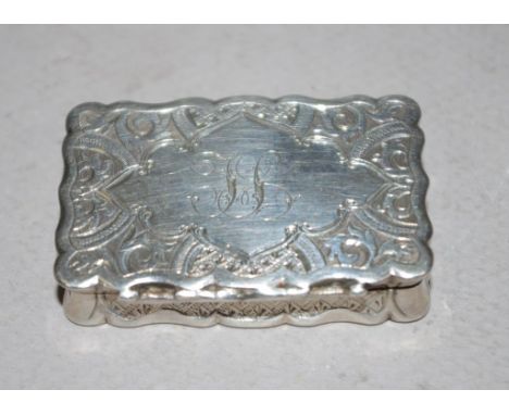 Victorian sterling silver snuff box Birmingham 1866, maker George Unite, embossed decoration to lid, sides and base, monogram