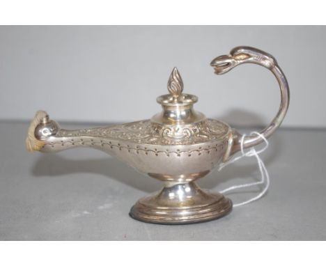 Edward VII silver oil lamp form lighter Sheffield 1905, makers Levesley Brothers, embossed decoration, with serpentile handle