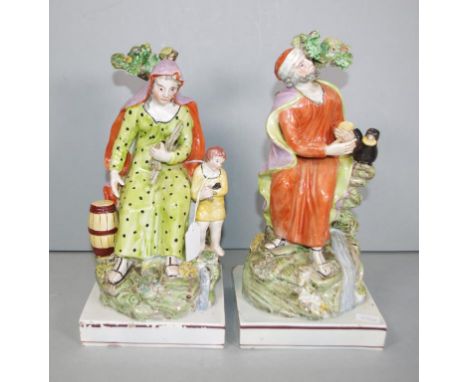 Two antique Pratt Ware ceramic figures including seated woman with child, (British Antique Association label to base), (heigh