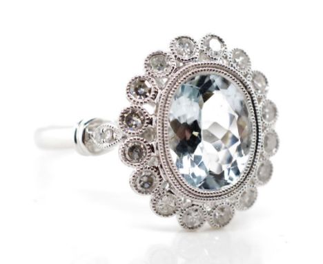 1.91ct Aquamarine, diamond and 18ct gold ring Edwardian style halo ring with fine mille grain bezel settings. Marked 18k, App