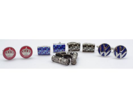 A collection of cufflinks. Mostly wing backs, includes enamel pieces.