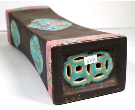 Chinese decorated ceramic pillow phoenix and peony decoration on green glazed cartouche, (length 34cm approx).