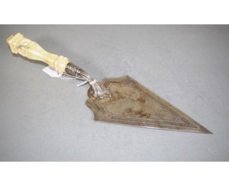 Sterling silver presentation trowel, with ivory handle, hallmarked London 1875, 32.5cm long, 203 grams total. This item may n