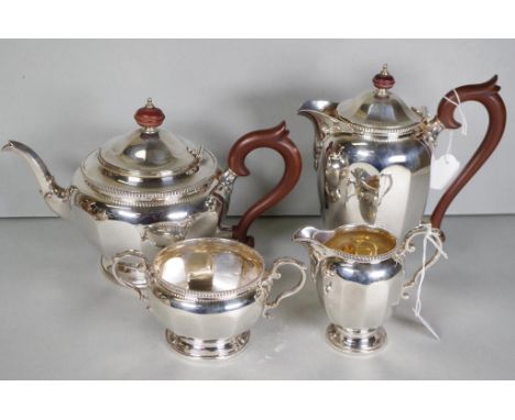 Four piece George V sterling silver teaset comprising of coffee pot, teapot, sugar and creamer, hallmarked Birmingham 1928, m