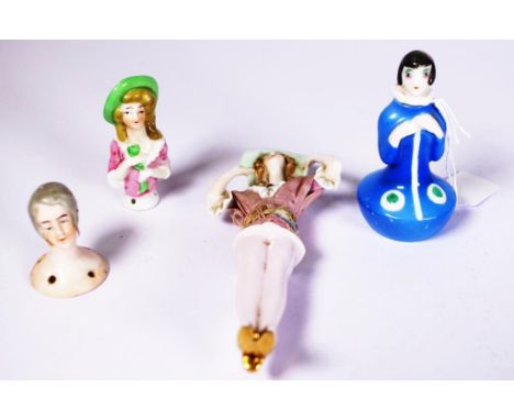 Three various vintage ceramic half dolls including head of woman; head and torso of dressed woman; head and separate legs of 