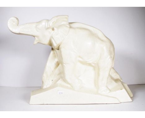 French craquelier cream glazed ceramic elephant titled Dolly to the base, and signed Lejan, height 30cm approx