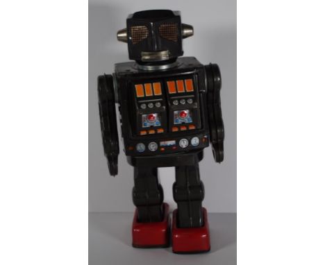 Tin toy Mr Zerox Horikawa vintage walking robot c1960. Battery operated. On/off switch replaced. Robot walks, and fires. Ches