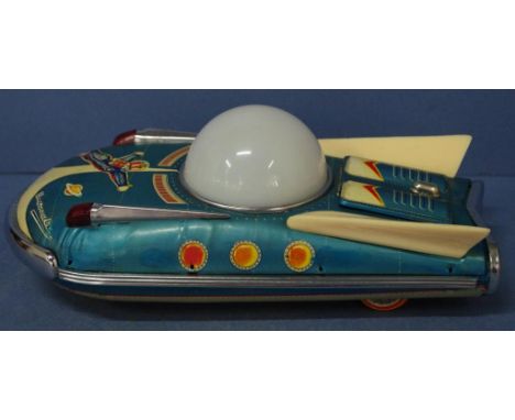 Tin toy vintage ME 089 Universe car with "bump and go" mystery action and working lighted dome.