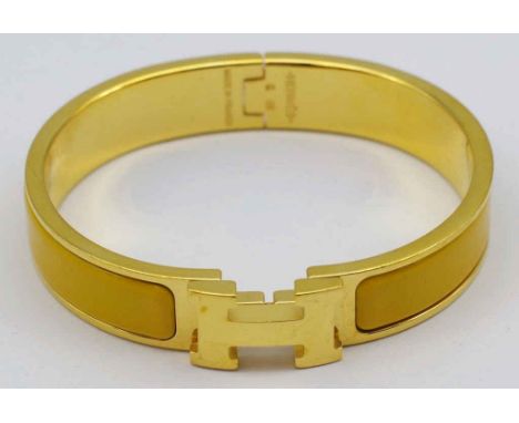 Hermes "Clic H Bracelet" gold plate and enamel bangle with H shaped clasp. Marked Hermes.