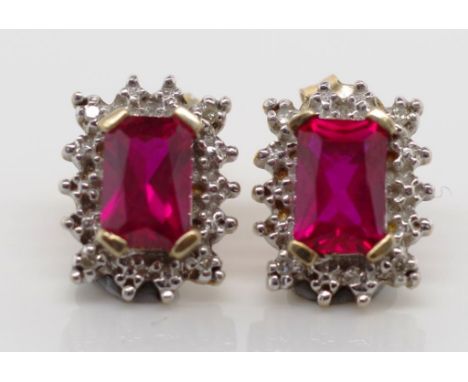 9ct gold diamond and ruby earrings. 2 grams weight approx. Marked 375.