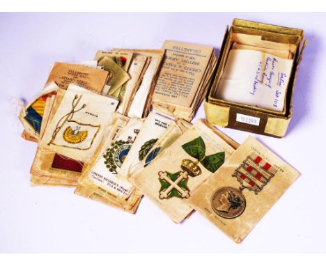 Collection early Wills silks cigarette cards depicting crests and badges of British Army Regiments and medals, approximately 