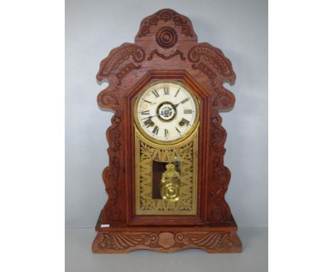 Vintage wood cased Ansonia cottage clock key and pendulum available. (height 57cm approx).