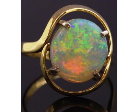 18ct gold and opal ring. Marked 18k Approx opal specifics 14mm x 12.3mm x 2.9mm cabochon cut ,estimated: weight 2.84ct, trans