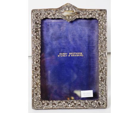 Vintage sterling silver photo frame embossed decoration, (18cm X 12.5cm approx).
