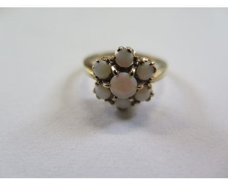 A 9ct yellow gold seven stone opal ring - size O - approx 3.6 grams - good condition 