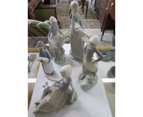 Five Lladro figurines of young ladies, largest approximately 36.5cm tall, smallest approximately 17cm high, two very small ch