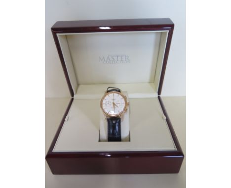 A gents Longines 18ct yellow gold Master collection flagship automatic wristwatch with calendar and two subsidiary dials - on