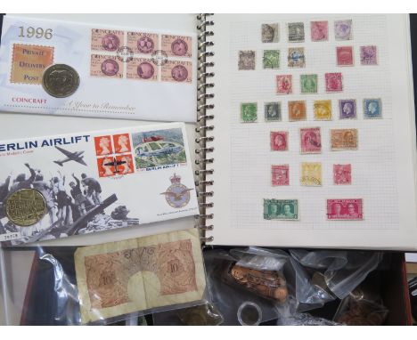 A collection of various Victorian and 20th century coinage mostly copper coins together with two part filled stamp albums and