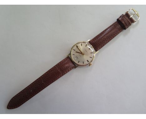 A9ct gold Garrard automatic gents wrist watch with date - 35mm wide including button in clean running condition 