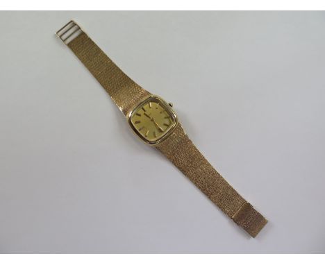 A gents Asprey 9ct yellow gold manual wind bracelet wristwatch, 33mm wide including button, 20cm long, No 22097 - total weigh