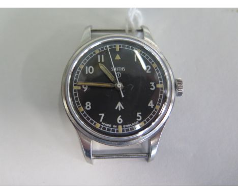 A military issue, Smiths W10 watch head with broad arrow markings, hacking function and Arabic dial, please see images for se