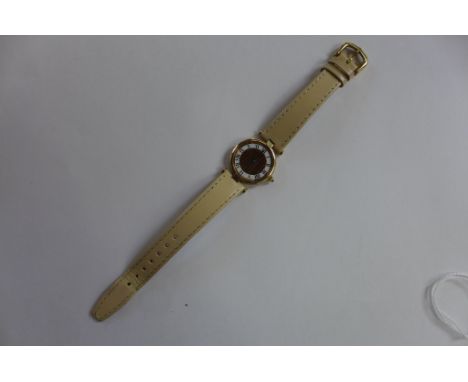A Cartier Vermeil Quartz gold plated ladies watch, No 152312 with multi colour dial, 25mm wide including button - in good cle