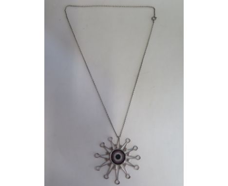 A Scottish silver and enamel pendant on a chain - 6cm diameter, Edinburgh 1975 - generally good 