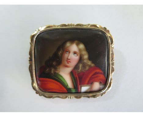 A porcelain portrait plaque in a yellow metal brooch mount, 4.5cm x 5cm - overall good condition 