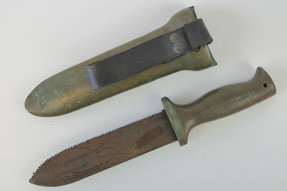 A WWII Royal Navy Deep Sea Divers knife with serrated blade, in