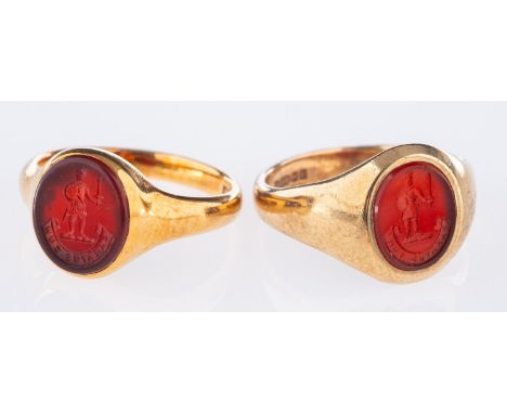 Two signet rings with carnelian seals, a 9ct yellow gold signet ring with the seal of the Campbell Crest, UK hallmark, size K