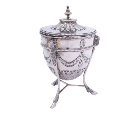 An Edward VII silver tea caddy by Goldsmiths & Silversmiths Co. Ltd, London 1908, in the Robert Adam style, the domed pull of