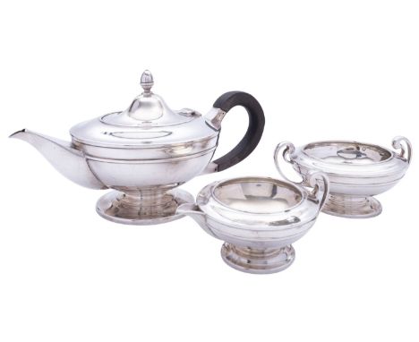 A George V silver three piece tea service by Roberts & Belk Ltd,  Sheffield 1919, of circular compressed form comprising of a