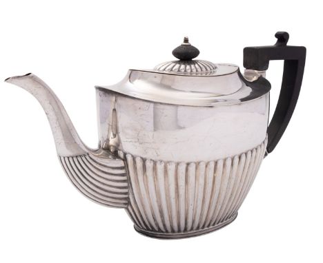 A George V three piece tea service by Richard Richardson, Sheffield 1919, half reeded oval form comprising: teapot, sugar bas