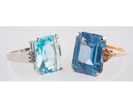 Two blue stone rings, a ring set with a rectangular step-cut synthetic blue spinel, in an openwork setting with scroll should