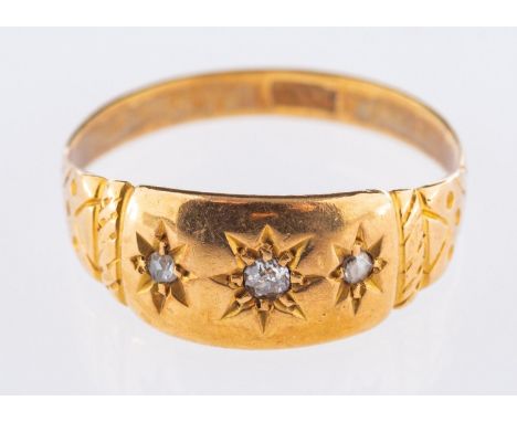A gypsy set ring, set with three old-cut diamonds, marked 18ct, partial hallmark, size N, 2.5grams. 