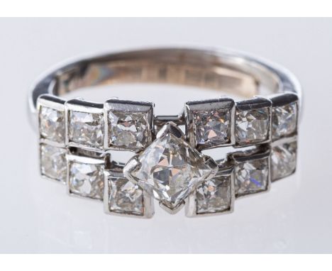 An Art Deco ring, of graduated geometric square design set with old mine-cut diamonds, diamonds approx. 1.46 carats total, un