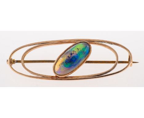 A stylised oval opal brooch, an openwork brooch set with an elongated oval opal cabochon, pin and catch fitting, indistinct m