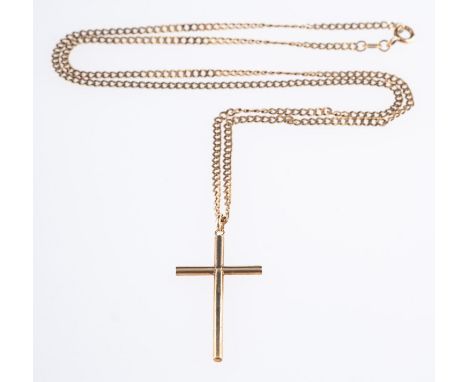 A plain cross designed pendant,  unmarked & untested, measuring 3.40cm x 1.70cm (inc.bale), on a 9ct yellow gold curb link ch