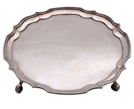 A Elizabeth II silver salver by Garrard & Co Ltd, London 1972, of circular form, with piecrust border, raised on four feet, i