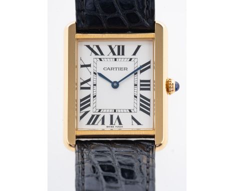 Cartier Tank Solo, a stainless-steel and gold wristwatch watch, the dial with black Roman numerals, spade hands and signed Ca