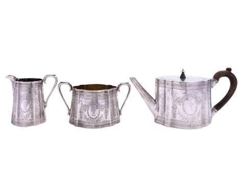 A Victorian three piece silver tea service by Edward, Edward junior, John & William Barnard, London 1871, of oval serpentine 
