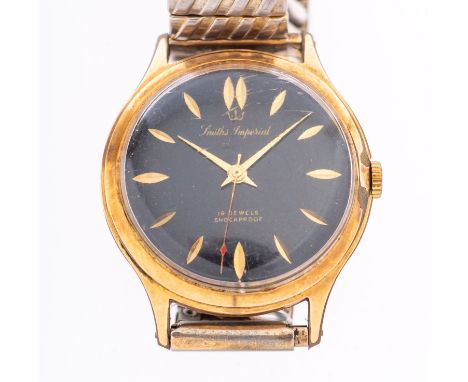 Smiths Imperial an early 1960s gentleman's gold-plated wristwatch the black dial with raised baton numerals, baton hands, swe