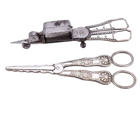 A George III silver mounted steel wick trimmer by Wilkes & John Booth, London circa 1810, the steel stamped with a crown and 