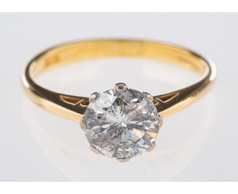 An 18ct gold diamond solitaire ring, set with a brilliant-cut diamond in an eight claw setting, diamond approx. 1.27 carats t