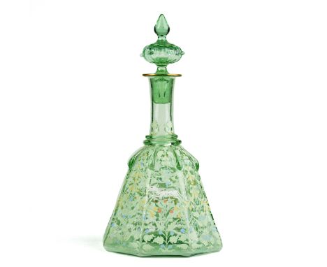 Late 19th century Bohemian Persian Vaseline uranium glass decanter decorated with an enameled and gilt design of four running