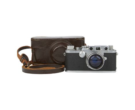 Leica D.R.P. Ernst Leitz Wetzlar camera, No. 525970. With Summitar f=5cm 1:2 camera lens, No. 787692. With brown leather case