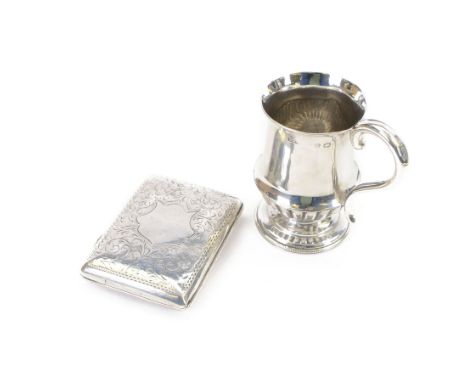 Edwardian silver cigarette case, of rectangular form, with engraved scrolling decoration and blank cartouche to front cover, 